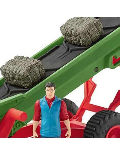 Hay conveyor with farmer