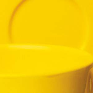 Filiżanka herbaty Excelsa ze spodkiem Modne żółte akcesoria domowe